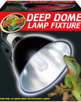 The Zoo Med - Deep Dome Fixture packaging showcases its ceramic base for UVB output, ideal for 24-hour heat or daylight lamps. It includes a sleek black reflector dome and a vibrant green reptile on a red box with bold white text.
