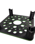 The AO - Skimmer Stand/Platform is a 3D-printed black and green plastic stand featuring four corner holders and multiple circular holes on its base, ideal for organizing small cylindrical objects.