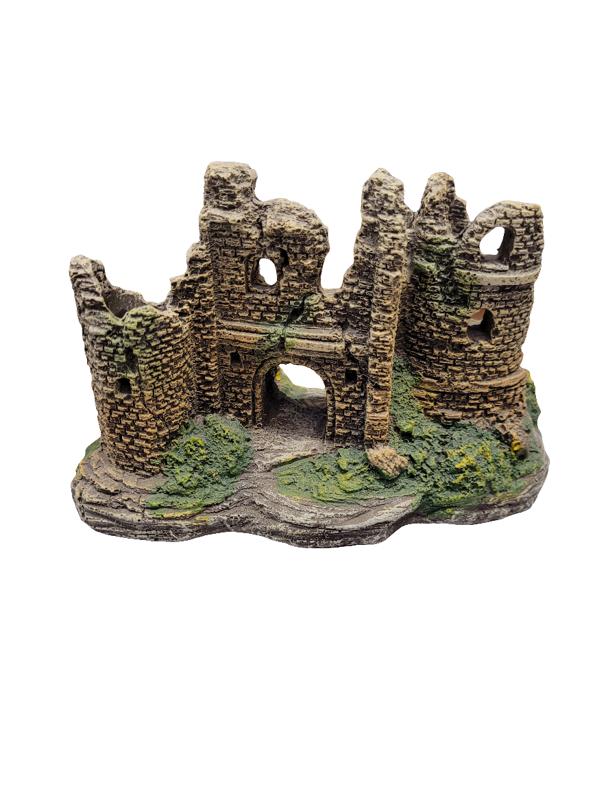 The Castle Gate Ruins Decor, 7 inches wide, is a miniature model of an ancient stone castle ruin with archways and circular towers. It features intricate details and green moss patches on a rocky base, giving it an abandoned look.