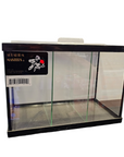 A small, rectangular glass aquarium with a sleek black frame features the Aquarium Masters - Deep Blue Professional label and a cute fish illustration. The tank is empty and set against a plain white background, ready for decoration.