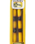 The yellow packaging labeled Flukers - Spring Action Bamboo Rod contains two bamboo-like bars ideal for enhancing reptile terrariums.