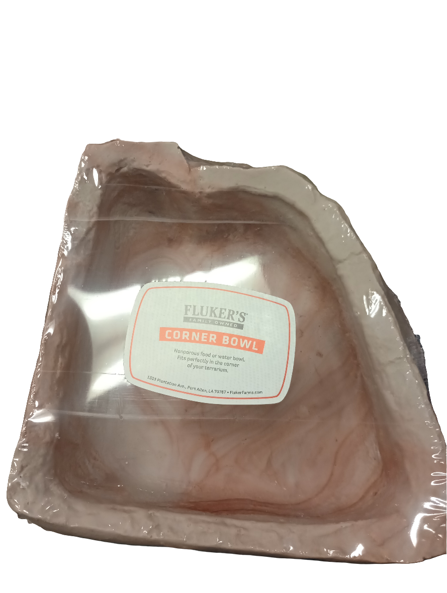 The Flukers Corner Bowl is a sealed, triangular dish for pet terrariums, crafted from a marbled pinkish material with a slightly raised border, ideal for water or food.