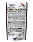 Back view of a Hikari - Crab Cuisine - Sinking - 1.76oz package shows product info, feeding instructions, ingredients, and company details in black text on white background, with illustrations of aquatic creatures.