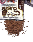 Open packet of Hikari - Crab Cuisine - Sinking - 1.76oz with brown pellet-style dry food spilling out, showing some text and a partial logo on the packet.