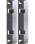 The Flipper - Max Replacement Blades Large consist of two vertical metallic brackets, featuring black and silver components with symmetrically arranged holes and notches. They look robust and functional, potentially for mounting or structural support.