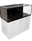 The Innovative Marine INT 170 Aquarium features a spacious, well-lit design with a black-framed transparent front panel. It comes with an APS stand in sleek white and paneled doors, includes an internal overflow system for seamless water management, and boasts a vast 170-gallon interior.