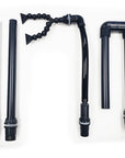 Innovative Marines INT 150 Lagoon Aquarium with APS Stand features advanced black plumbing parts on a white background, including pipe segments and valve fittings for efficient water flow management.