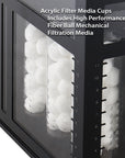 Close-up of a black filtration system with transparent compartments holding white fiber balls. Text above says: Innovative Marine Acrylic Filter Media Cups include Fiber Ball Mechanical Filtration Media, ideal for NUVO Aquariums in the Innovative Marine INT 112 Gallon Lagoon Aquarium Reef System.