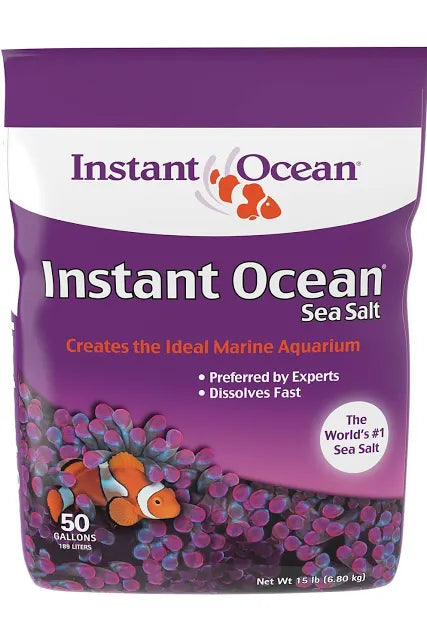 The Instant Ocean Sea Salt Dry Mix 50 Gal bag, in purple and white with a clownfish image, dissolves quickly, supports coral growth for reef aquariums, and is free from nitrates and phosphates. This 15 lb package treats 50 gallons.