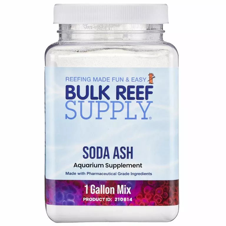 Container labeled Bulk Reef Supply - Pharma Soda Ash Aquarium Supplement for reef tanks, with the text: Reefing Made Fun & Easy. Includes details such as 2-part dosing with a 1 Gallon Mix and Product ID: 210814, set against a backdrop of white bubbles and colorful specks.