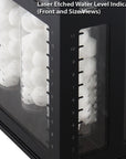 A black container with clear panels displays laser-etched water level indicators, ideal for the Innovative Marine -INT 200 Gallon Complete Reef System. Inside are two vertical tubes filled with white spheres. The top text reads, Laser Etched Water Level Indicators (Front and Side Views).