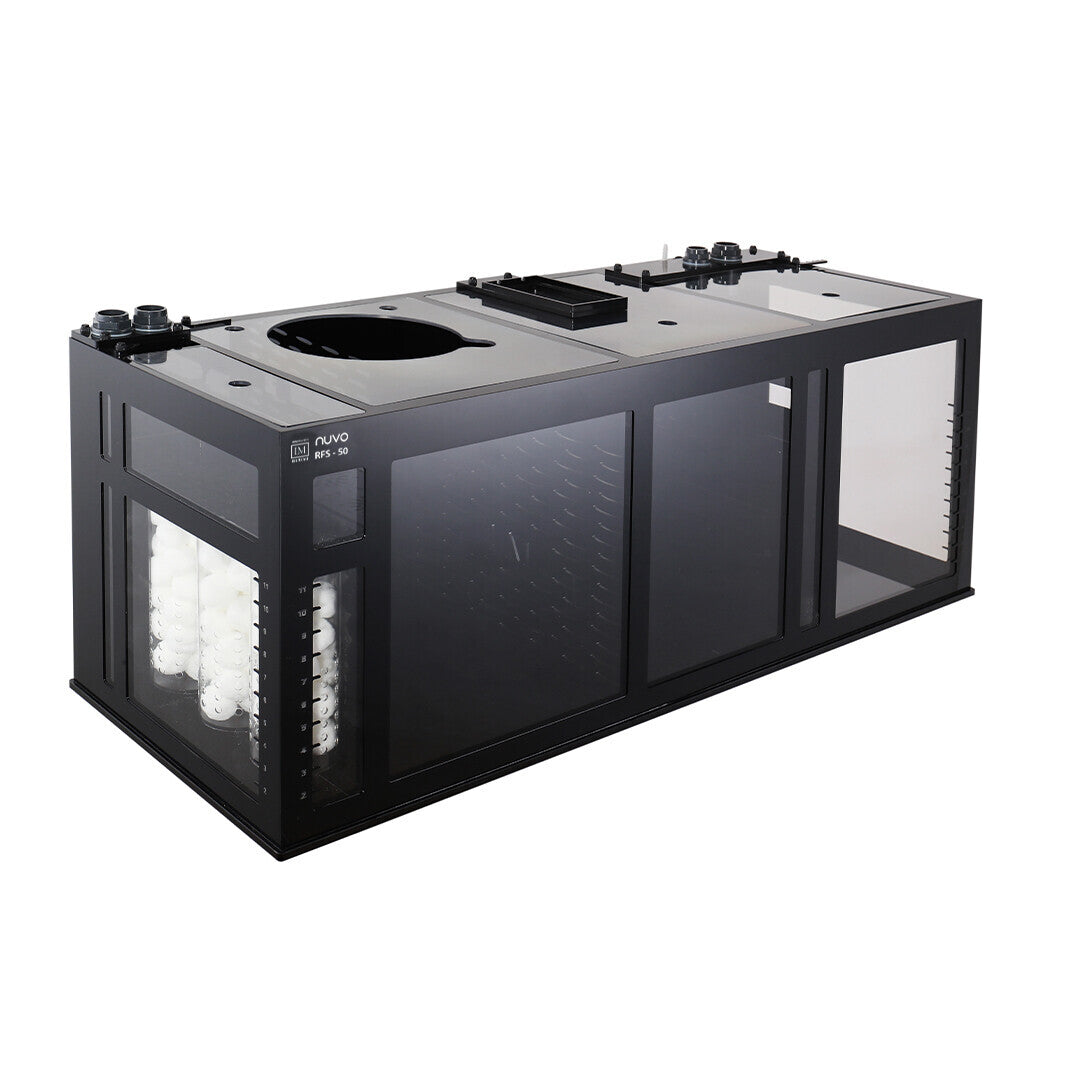 This image showcases the Innovative Marine -INT 200 Gallon Complete Reef System, a rectangular black aquarium sump with transparent panels. It is designed for optimal saltwater management, featuring multiple filtration chambers with white filter media and control knobs for efficient water purification.