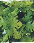 Close-up of Zoo Meds Amazonian Phyllo - Large, showcasing vibrant artificial green foliage with diverse leaf shapes and textures for a lush, dense look. Intricately cut leaves mimic various natural plants.