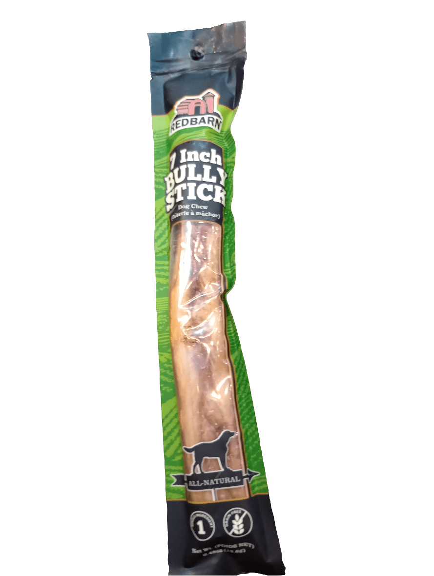 A packaged Redbarn 7" Bully Stick dog chew features dark green and red packaging with an image of a cow and text highlighting its all-natural quality.