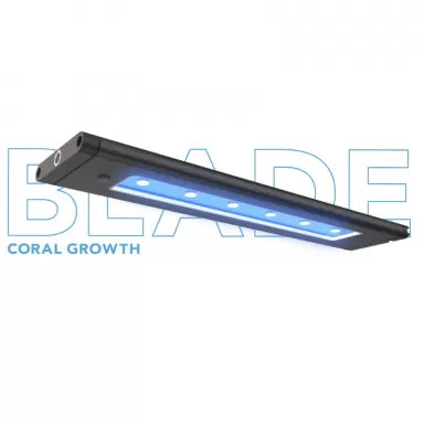 A sleek, rectangular LED aquarium light with blue illumination, specifically designed for coral growth. The partial words "AI - Blade - Coral Grow 12"" can be seen in the background.