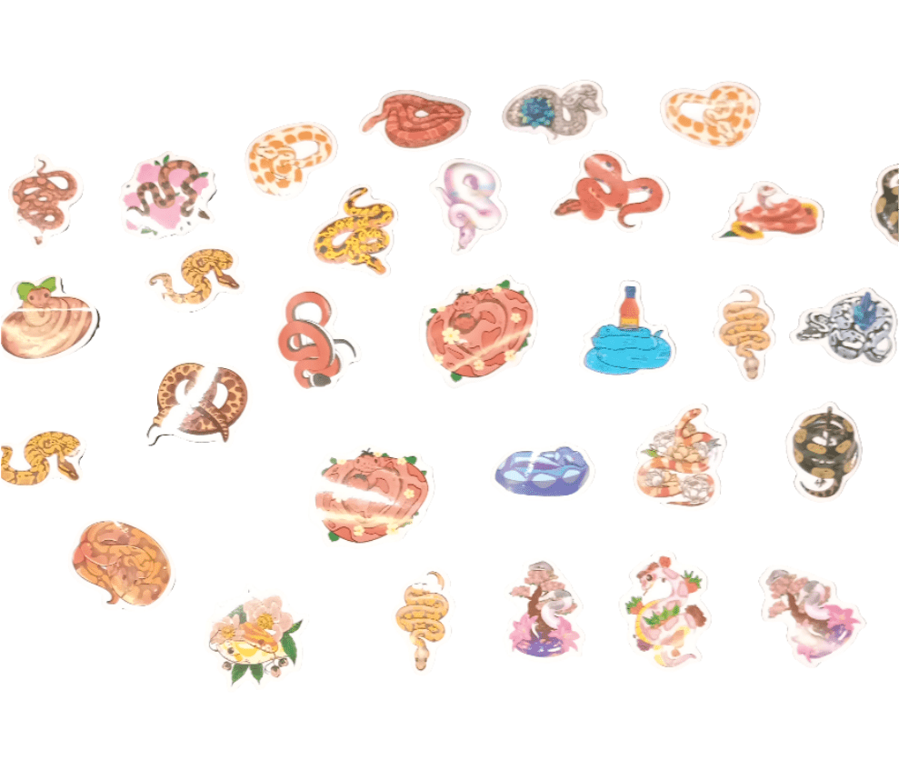 The AO - Asst. Sml Sticker set includes a variety of colorful snakes depicted in different poses and patterns, arranged in a loose grid format. These illustrated stickers showcase snakes in vibrant hues such as orange, yellow, blue, and brown, all beautifully contrasted against a white background.