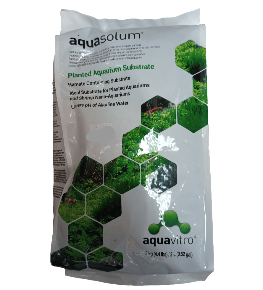 Aquasolum Black Humate packaging by Aquavitro emphasizes its suitability for planted aquariums and shrimp nano-aquariums, with a design aimed at reducing alkaline water pH, decorated with green plant imagery set against hexagonal patterns.