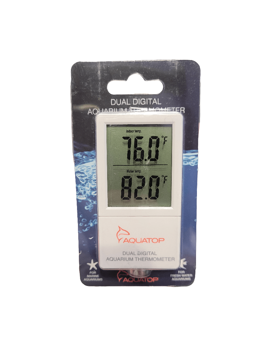 The Aquatop - Dual Digital Aquarium Thermometer packaged display shows an indoor temperature of 76.0°F and a water temperature of 82.0°F, with packaging that features water graphics and brand logos.