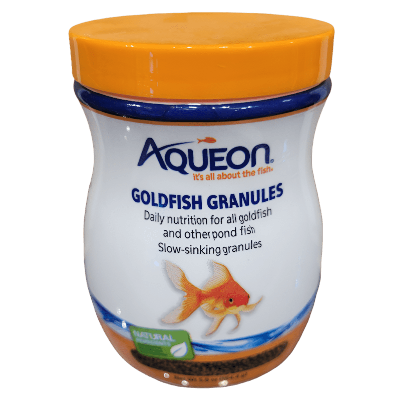 A jar of Aqueon Goldfish Granules, weighing 5.8 ounces, comes with an orange lid and a label showcasing a goldfish. The label indicates that it offers daily nutrition for goldfish and other pond fish, with granules that sink slowly.