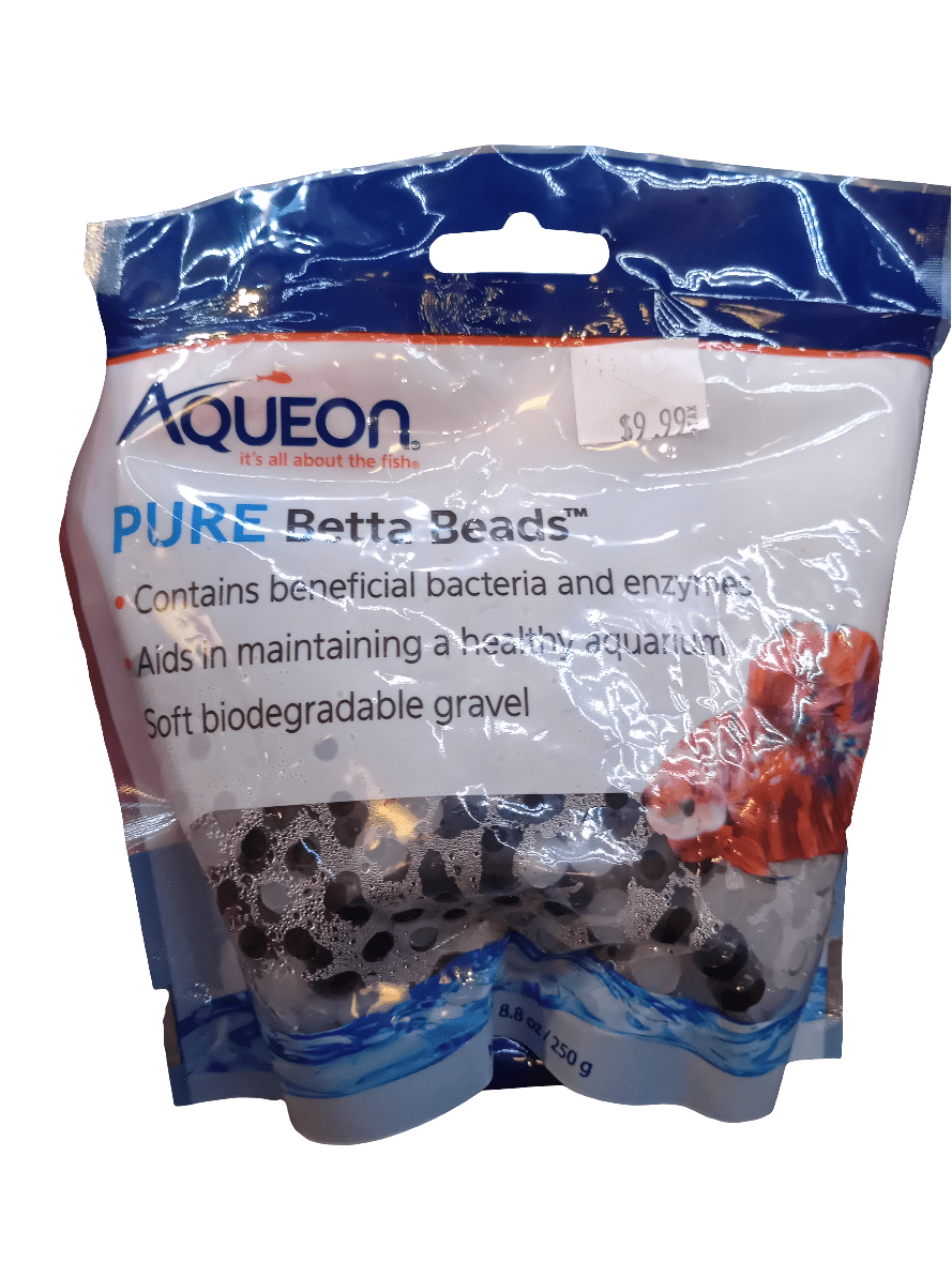 A package of Aqueon Pure Betta Beads Blk/wht showcases features on the front label such as containing beneficial bacteria and enzymes, helping to maintain a healthy aquarium, and comprising soft biodegradable gravel. The price is marked at $9.99.