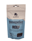 A bag of Benepets - Benepellet Reef - Large 3mm - 76g fish food, featuring blue and white packaging with a black logo on top. It is scientifically balanced for reef nutrition and designed for a low nutrient impact.