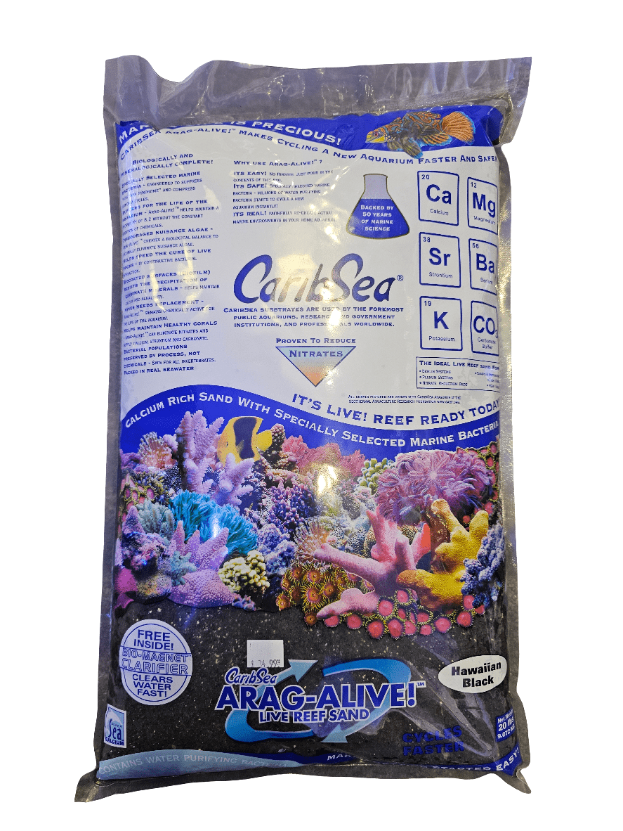 A 20-pound bag of Caribsea - Arag Alive - Hawaiian Black showcases vibrant marine imagery and highlights its calcium-rich sand combined with beneficial marine bacteria to promote rapid aquarium cycling.