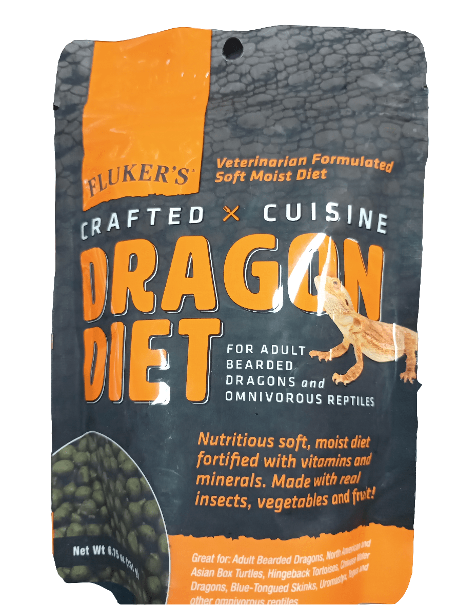 A package of Flukers Dragon Diet 6.75, adorned with a bearded dragon image, promotes itself as a soft, nutritious diet tailored for adult bearded dragons and other omnivorous reptiles, crafted from insects, vegetables, and fruit.