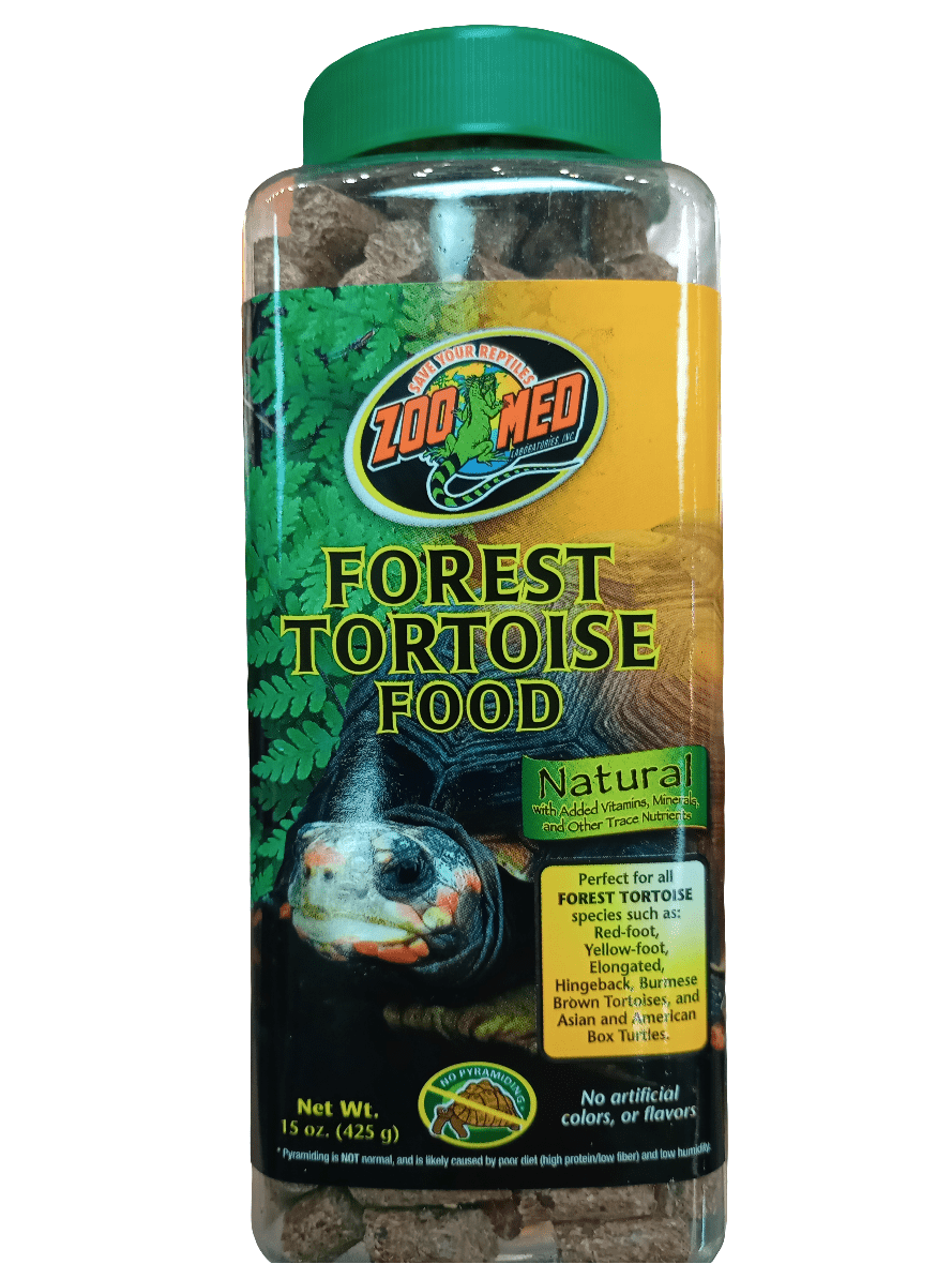 A clear plastic container of "Forest Tortoise Food 15oz Zoo Med" with a green lid features an image of a tortoise. The label highlights the natural food enriched with vitamins and minerals, ideal for forest tortoise species such as the Yellow-foot, Red-foot, and Box Turtles.