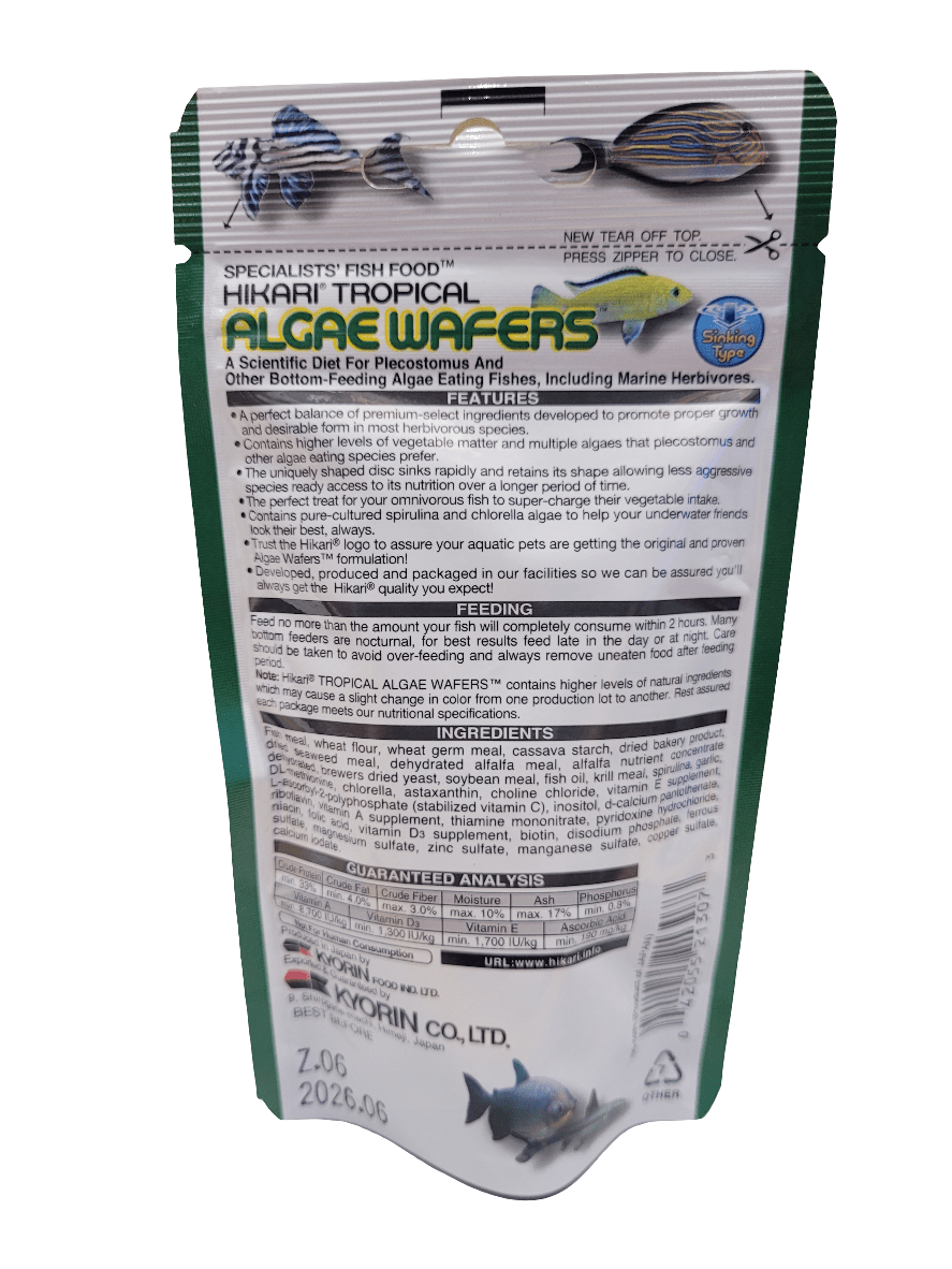 A 1.41 oz package of Hikari Algae Wafers, created for plecostomus and algae-eating marine fish, includes product details, feeding instructions, and nutritional information on the packaging.