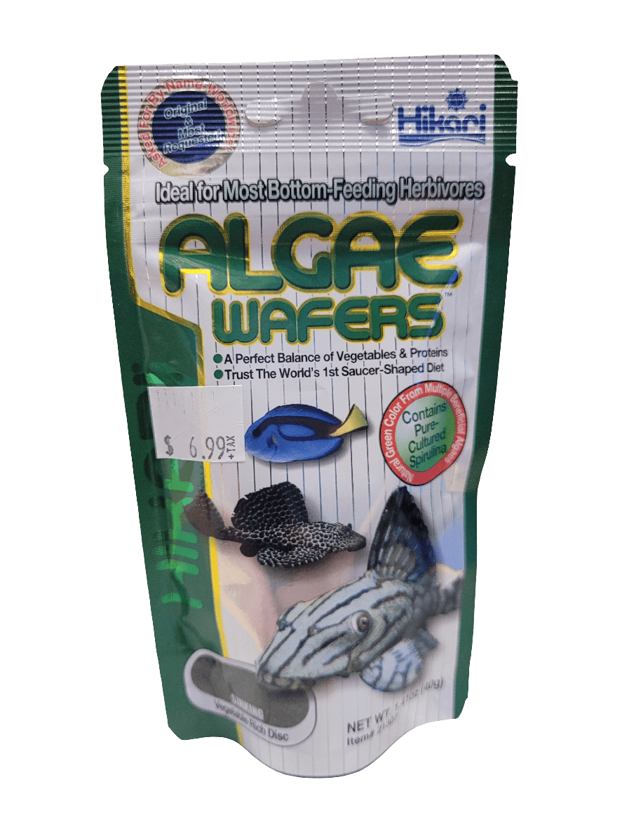 A 1.41 oz package of Hikari Algae Wafers, priced at $6.99, showcases images of fish and includes detailed product information. Crafted for bottom-feeding herbivores, it offers a balanced mix of vegetables and proteins and contains pure cultured spirulina.