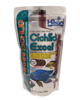 A package of Hikari - Cichlid Excel - Medium Floating fish food, adorned with images of vibrant fish. The packaging emphasizes its suitability for herbivorous cichlids and benefits like vegetable content and easy digestion. Net weight: 8.8 oz (250g).