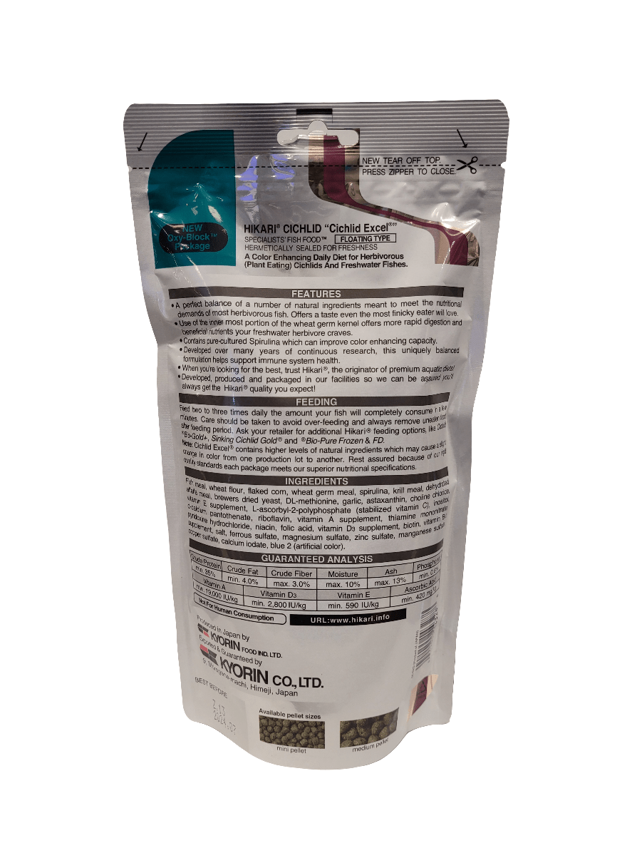 Back view of a package of Hikari - Cichlid Excel - Medium Floating - 8.8oz, a daily diet designed to enhance the color of herbivorous fish. The packaging features information on tearing and resealing, details about product benefits, ingredients list, and nutritional analysis.