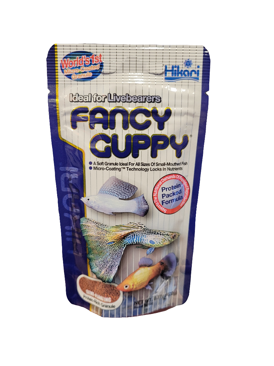 A 22g package of Hikari Fancy Guppy Pellets features colorful guppy images, is labeled protein-packed, ideal for livebearing fish, and boasts Micro-Coating technology.