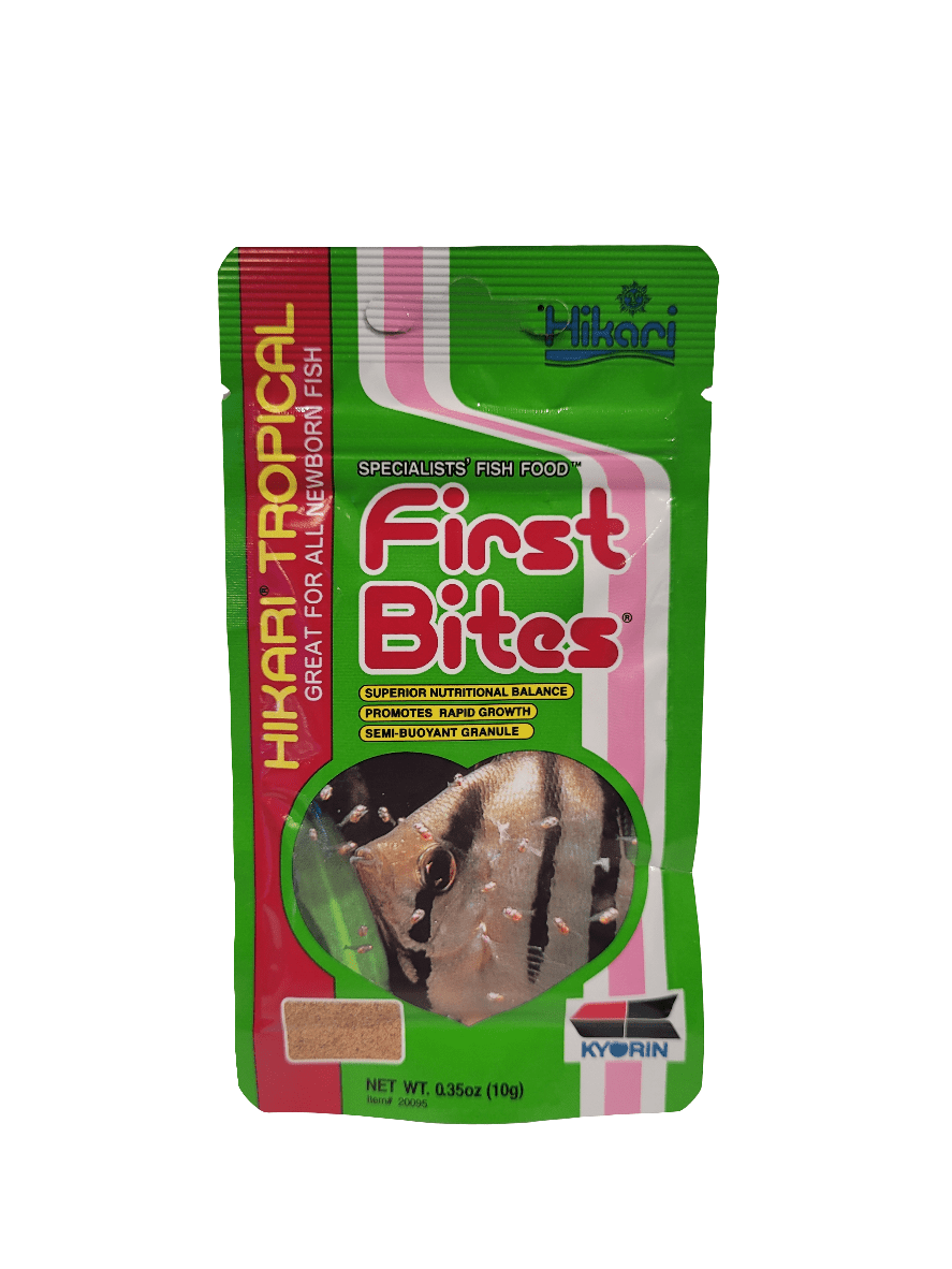 A package of Hikari - First Bites - .35 Oz fish food. The packaging, in vibrant green and red, showcases an image of a fish, includes text emphasizing its nutritional benefits, and has a net weight of 0.35 oz (10g).