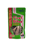 A package of Hikari - First Bites - .35 Oz fish food. The packaging, in vibrant green and red, showcases an image of a fish, includes text emphasizing its nutritional benefits, and has a net weight of 0.35 oz (10g).