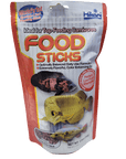 A package of Hikari Food Sticks for carnivorous fish, featuring a balanced formula, sponge-like texture, and color enhancement. The packaging is adorned with imagery of fish and is priced at $24.99. This specific product is the 250g floating variant from Hikari.