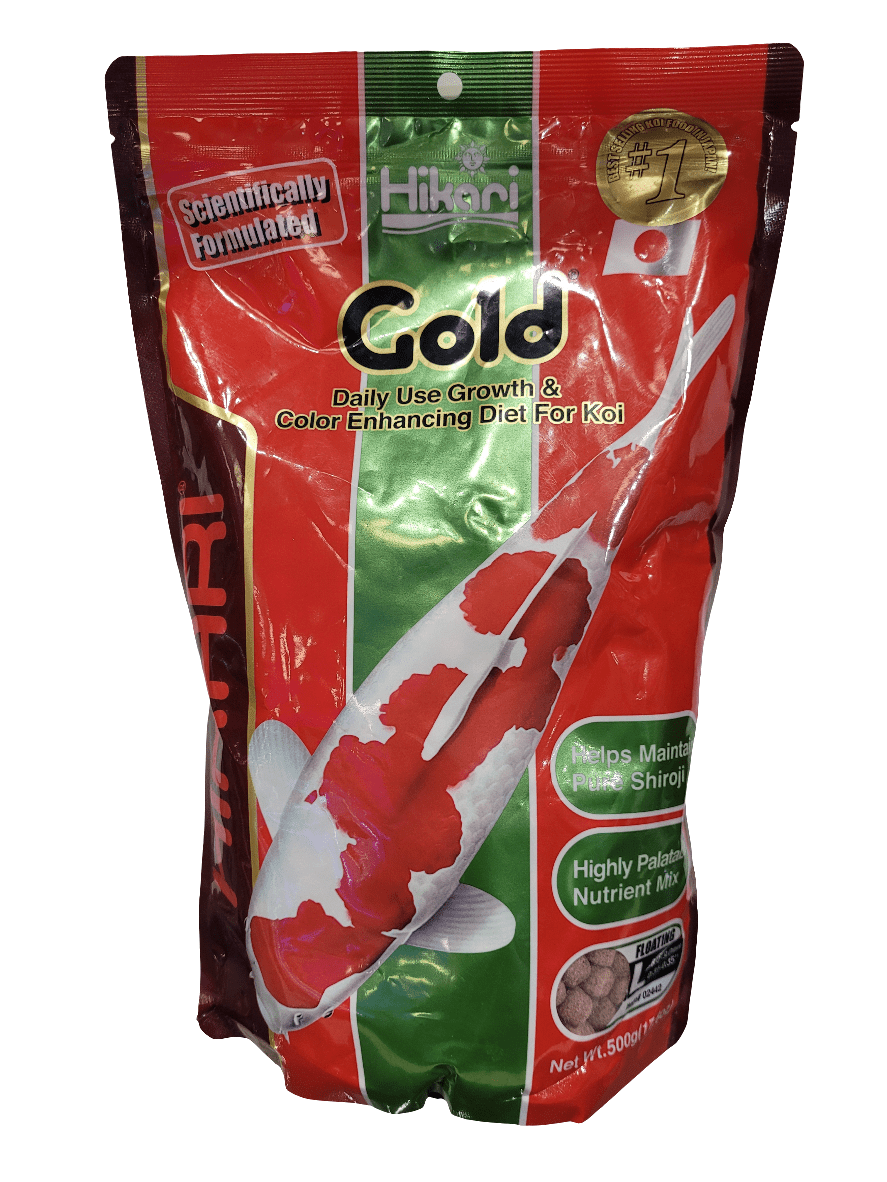 A 500g red and green bag of Hikari - Gold Koi Pellet - Floating Large fish food, adorned with an illustration of a Koi fish showcasing red and white markings. The packaging emphasizes the product's benefits for promoting growth and enhancing the color of Koi.