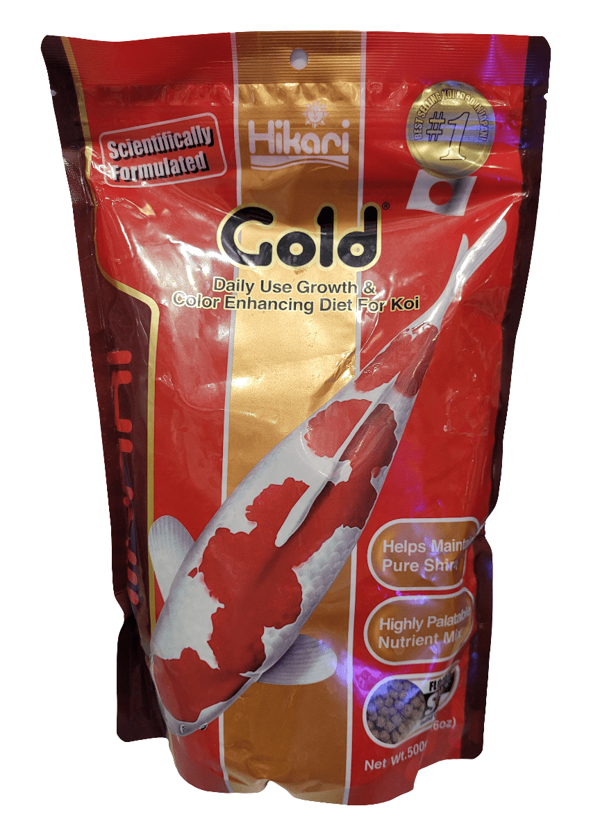 A package of Hikari - Gold Koi Pellets, designed for daily use with a focus on growth and color enhancement, comes in a red and white design. It promotes pure shine and high palatability, with a net weight of 500g.