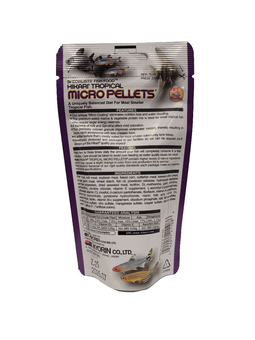 Photograph of a purple and white package labeled "Hikari - Micro Pellets - Semi-floating - 1.58 Oz," which is a specialized fish food. The packaging includes detailed information about the product, including its nutritional analysis, ingredients, and benefits, along with images of fish at the top.