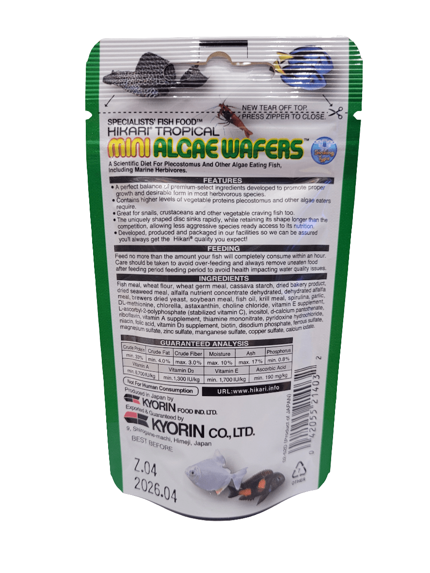 A .77oz packet of Hikari Mini Algae Wafers for fish, showcasing imagery of fish on the packaging. Manufactured by Kyorin Food Industries, it includes nutritional information and a resealable top, with an expiry date listed as April 2026.