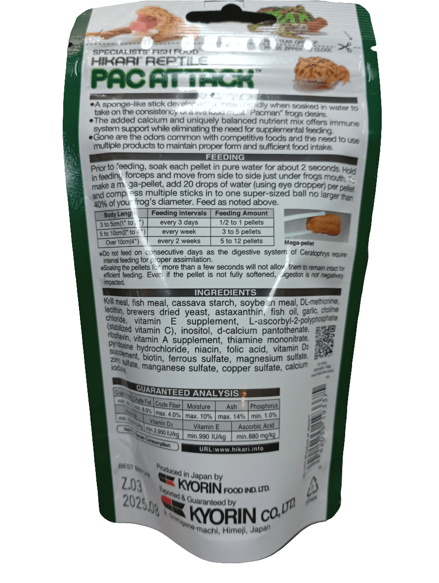 A package of Hikari Pac Attack!™ food, intended for reptiles, features a white and green bag with a clear window at the top. The packaging includes instructions for use, ingredients, guaranteed analysis, and manufacturer details.