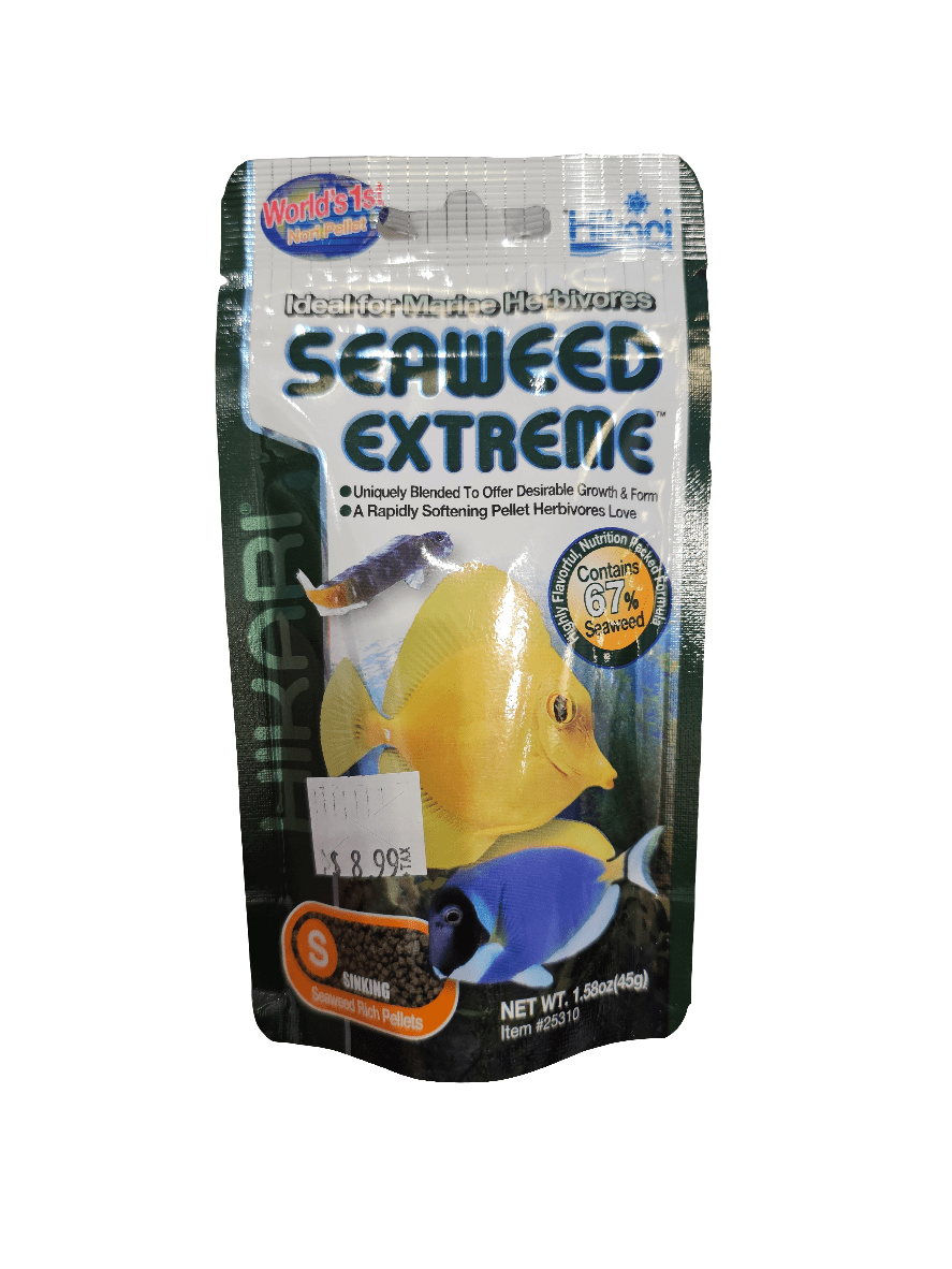 A shiny package of Hikari Seaweed Extreme, weighing 1.58oz, displays an image of colorful fish and emphasizes its 67% seaweed content. It is designed for herbivorous fish and is priced at $8.99.