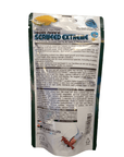 A package of Hikari Seaweed Extreme 3.52oz fish food. The packaging is white with blue and green text, displaying product details and ingredients, along with a small image of a colorful marine fish at the bottom.