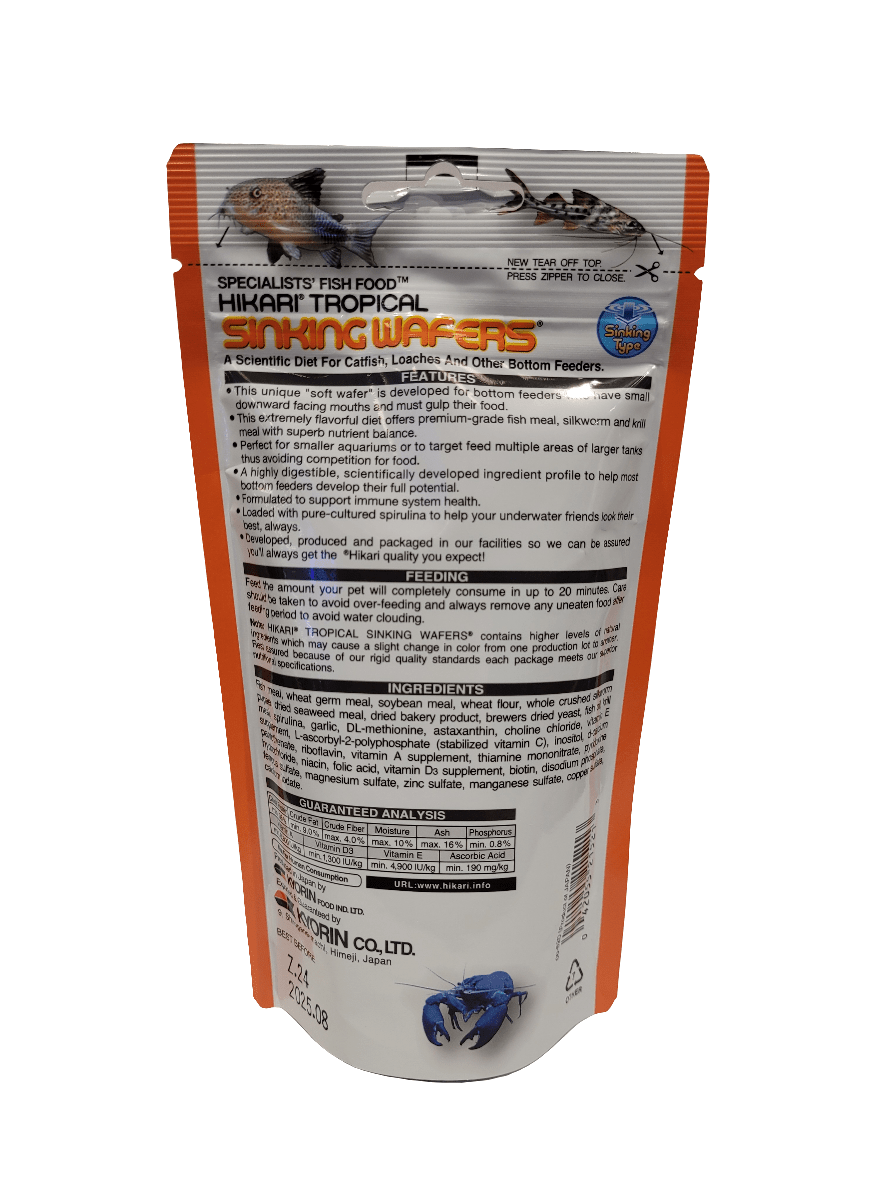 Clear plastic bag of Hikari - Sinking Wafers - 3.88oz fish food. The packaging displays images of fish and detailed product information, including feeding instructions and ingredients. Suitable for catfish, loaches, and other bottom feeders.