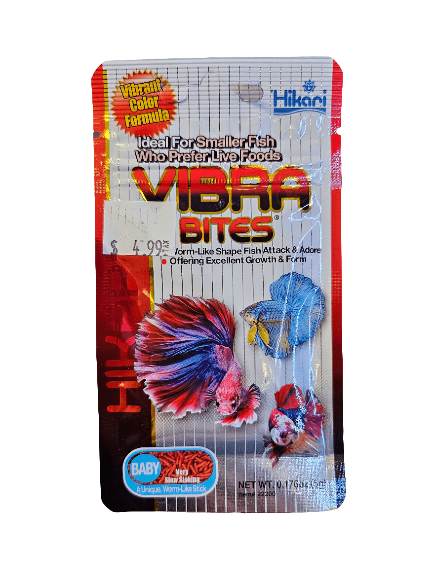 A small orange package of Hikari VIBRA Bites Baby fish food showcases images of vibrant betta fish. The packaging emphasizes its benefits for smaller fish and its intense color formula, with a price of $4.99 and a net weight of 0.176 oz (5 g).