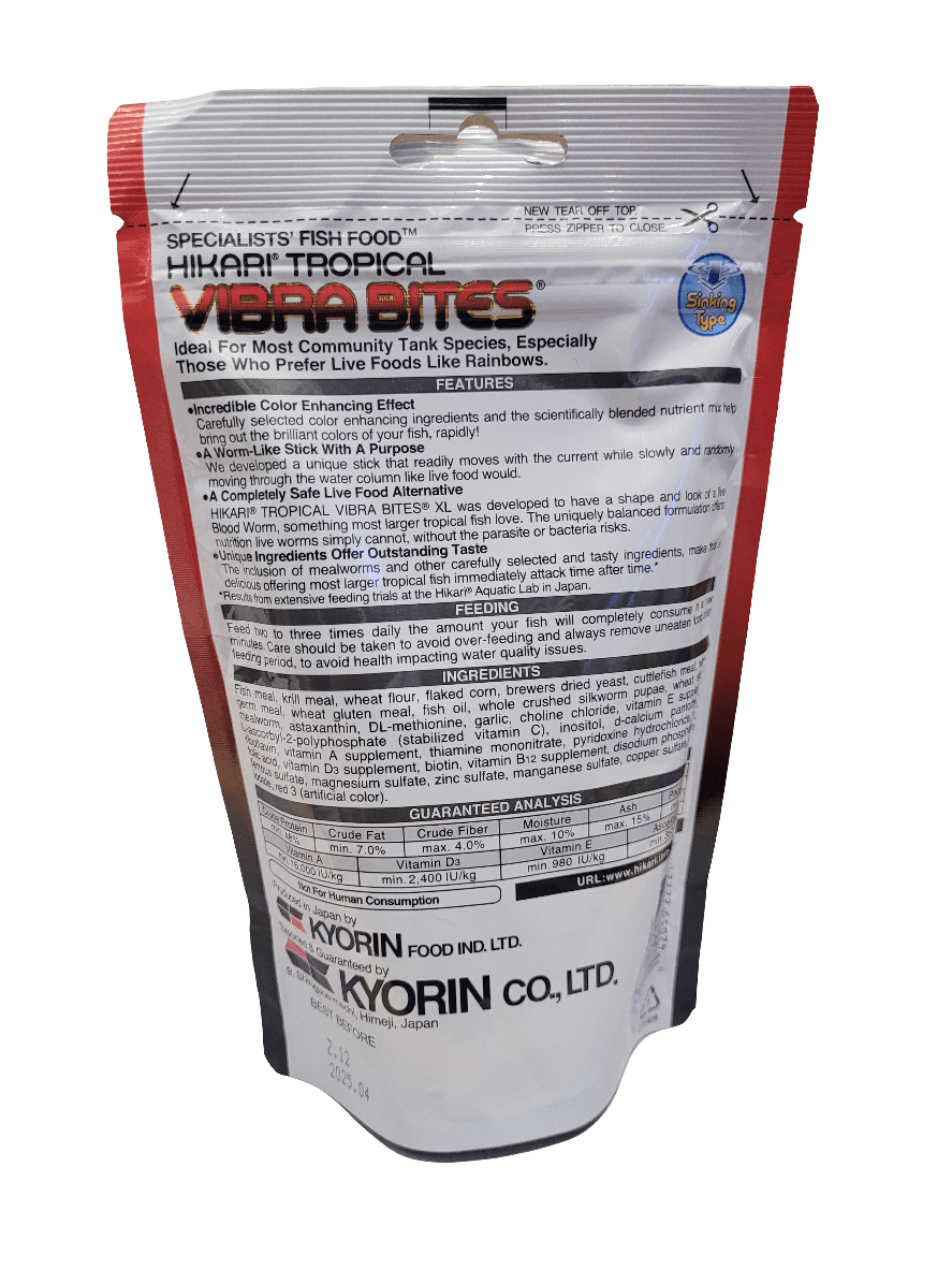 A red and white package of Hikari - Vibra Bites - XL 4.4oz fish food. The bag displays text highlighting ingredients, benefits for fish health, and feeding instructions. It is designed for species in community tanks.