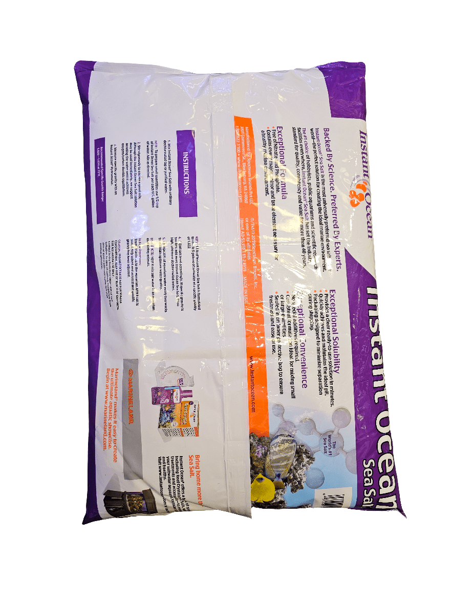 The Instant Ocean - Sea Salt - Dry Mix 50 Gal, packaged in a striking purple and white plastic container, is ideal for reef aquariums. It creates artificial seawater free from nitrates and phosphates, designed to promote coral growth. The packaging offers user-friendly advantages with clearly displayed usage instructions.