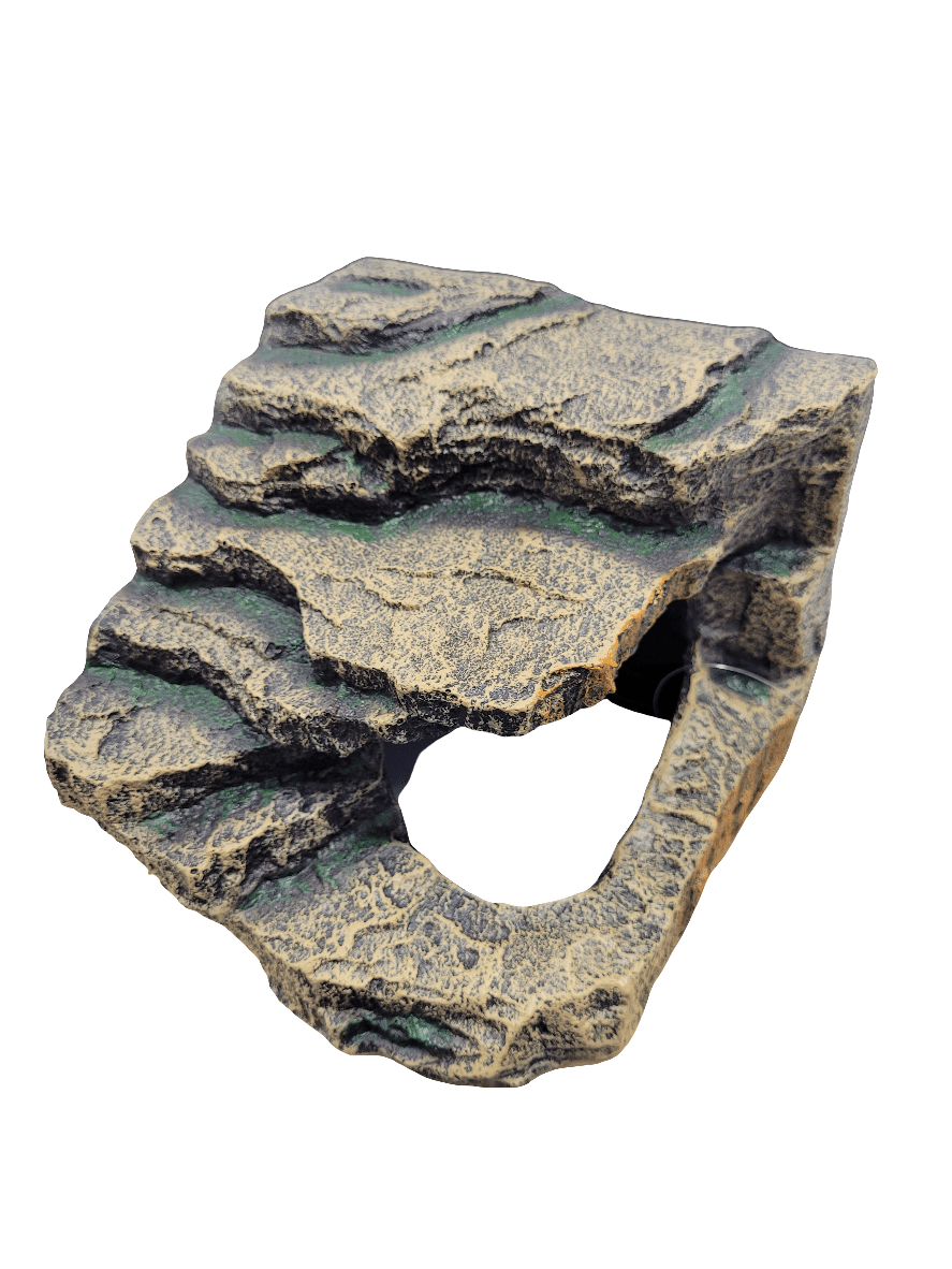 A medium-sized Komodo - Rock Corner Hide featuring a textured, rugged surface and an arch-shaped opening that resembles natural rock formations.