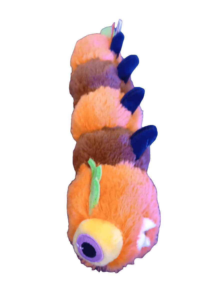 The Monsterkin Asst. 8" is a plush toy designed to resemble a colorful caterpillar, featuring orange and brown segments, small black spikes along its back, and a prominent eye on its front. It is adorned with green leaf-like decorations on its head.