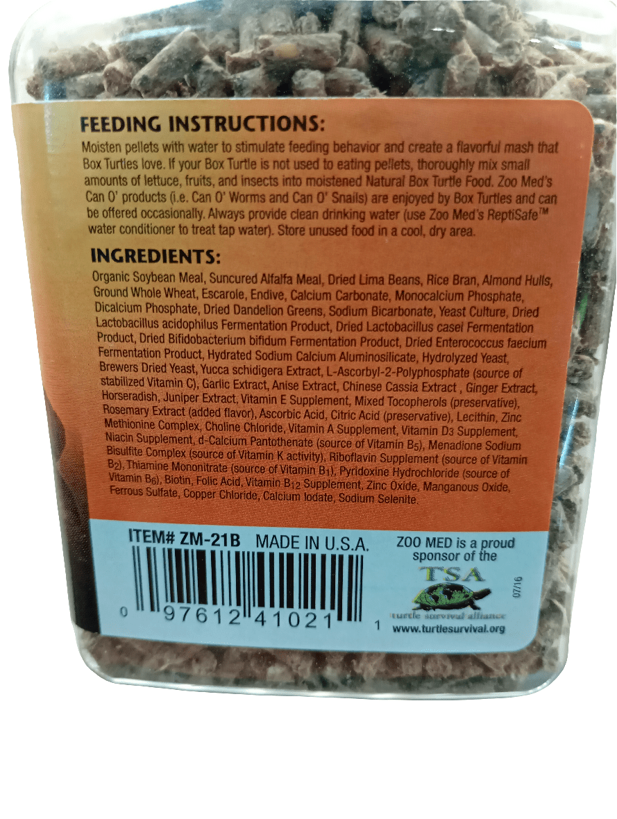 Detailed view of a label for Natural Box Turtle Food by Zoo Med, emphasizing the feeding instructions and a selection of nutritious ingredients such as soy, alfalfa meal, and dried lima beans, rich in fiber. The label includes the brand name "Zoo Med" and displays a barcode at the bottom.